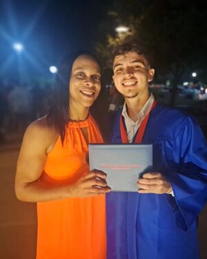 Camille Ligon Instagram - Celebration Season 🧨🥳🎊

Texas heat and the struggle of getting my shoulders into this dress...all worth it to witness my nephews' high school graduation. On to the next chapter he goes🙏🏽🙏🏽 #proud 

#celebrate #graduation #chapters #texas #flexfriday #family #sanantonio #fitfamily #summer