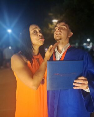 Camille Ligon Instagram - Celebration Season 🧨🥳🎊

Texas heat and the struggle of getting my shoulders into this dress...all worth it to witness my nephews' high school graduation. On to the next chapter he goes🙏🏽🙏🏽 #proud 

#celebrate #graduation #chapters #texas #flexfriday #family #sanantonio #fitfamily #summer