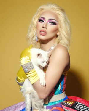 Captivating Katkat Instagram - The world will be better if we had the ability to love as unconditionally as our pets.
Its National Pet Day, lets show some love to our fur babies 🐾🐈‍⬛🐱🐩🐶

Wearing recycled cat/dog food sacks
Gown created @robertmg
Hair @francinehairextension
Assisted @captivateamkatkat 
Photography @jagger_studios 
🐈 Elsa
🐈‍⬛ Panther