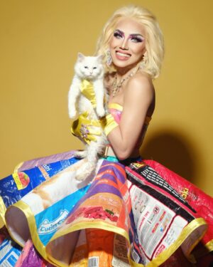 Captivating Katkat Instagram - The world will be better if we had the ability to love as unconditionally as our pets.
Its National Pet Day, lets show some love to our fur babies 🐾🐈‍⬛🐱🐩🐶

Wearing recycled cat/dog food sacks
Gown created @robertmg
Hair @francinehairextension
Assisted @captivateamkatkat 
Photography @jagger_studios 
🐈 Elsa
🐈‍⬛ Panther