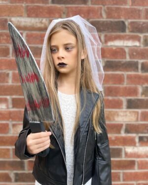 Carina Battrick Instagram - The Bride of Chucky (maybe in 20 years) and my collection of evil dolls
.
.
.

.

#happyhalloween  #costume #chucky #chuckytvseries  #costumes #haloweenparty #carolinecross #pictureoftheday #kidsstyle #igkids #bride #brunette #tiff #modelling #modelkids #makebelieve #tiffanyvalentine #tiffany #halloweenmakeup #halloweencostume #halloween2022 #annabelle #voodoo #voodoodoll #evil #evildolls #dolls #doll #brideofchucky