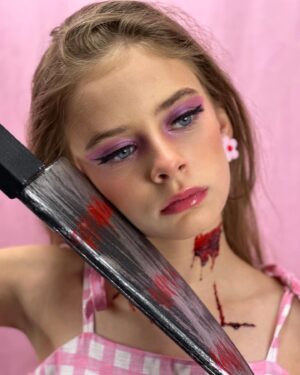 Carina Battrick Instagram - And Finally-halloween barbie-is here! Supplies are limited 😉.
.
.
.

#barbiemovie #pink #carinabattrick #blond #blondehair #blueeyes #margot #masgotrobbie #blond #robbie #barbieworld #barbiepink #halloween #halloween2023 #costume #dressup #horrormovies #horror #knife #scary #carolinecross #mattel