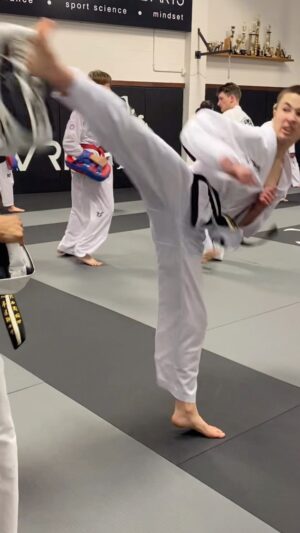 Carl Van Roon Instagram - Young James with the ambidextrous flow! ✌🏻 Can you do this drill? Send us your version! #taekwondo #karate #mma #kickboxing #vanroonmartialarts #nextgeneration #kaizen #ambidextrous