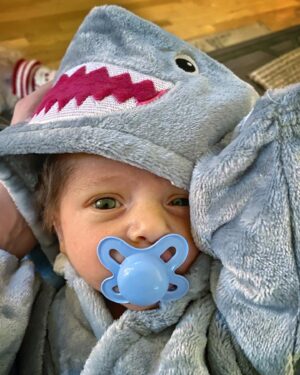 Carlee Baker Instagram - A lot of ups and downs in 2022 — mostly ups for @thecarleebaker and I, fortunately! — but nothing beats welcoming our new future JAWS fan into the world. Happy New Year, family, friends and fishies!