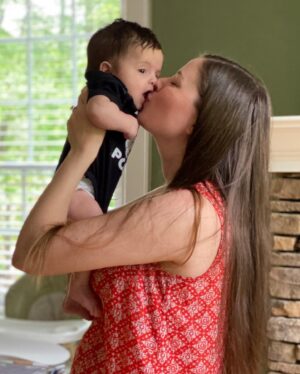 Carlee Baker Instagram - Kisses and cuddles with my favorite little guy. Moments captured by my favorite big guy. 💙💙💙

#beckettjones #littlelauzirika