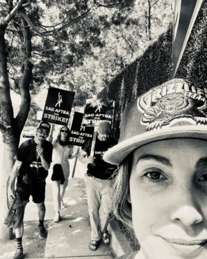 Carly Pope Instagram - Strike Girl Summer.

This labour movement is vital. The stakes are high, y’all. 
Make some noise. 

#sagaftrastrong #sagaftrastrike #unionstrong #strikegirlsummer
