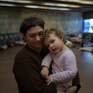 Cary Joji Fukunaga Instagram - Hundreds of people still live in the Heroes of Dnipro metro station in the Obolon district of Kyiv, many of them children. Despite Russia’s retreat, most fear Russian reprisal attacks, and air raid sirens still sound throughout the night. Galyna runs this station. She hasn't been home since the war began as there is still too much to do. The first days saw up to 2800 people crowding into the cold-war era shelter, replete with an underground cafe and pharmacy, and in case of a nuclear attack, 40cm thick iron blast doors that still shut at curfew. Volunteers from @wckitchen deliver meals and fresh fruit daily, where we met Dima who shared with us his dream of leading a boy-band (note @btsbighitofficial pin) one day. Also pictured are local volunteers entertaining the children and handing out toys. One side of the station had set up a cinema for the kids, and on our last visit I was surprised to see the movie of the night was… #notimetodie :)