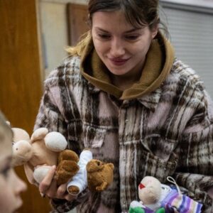 Cary Joji Fukunaga Instagram - Hundreds of people still live in the Heroes of Dnipro metro station in the Obolon district of Kyiv, many of them children. Despite Russia’s retreat, most fear Russian reprisal attacks, and air raid sirens still sound throughout the night. Galyna runs this station. She hasn't been home since the war began as there is still too much to do. The first days saw up to 2800 people crowding into the cold-war era shelter, replete with an underground cafe and pharmacy, and in case of a nuclear attack, 40cm thick iron blast doors that still shut at curfew. Volunteers from @wckitchen deliver meals and fresh fruit daily, where we met Dima who shared with us his dream of leading a boy-band (note @btsbighitofficial pin) one day. Also pictured are local volunteers entertaining the children and handing out toys. One side of the station had set up a cinema for the kids, and on our last visit I was surprised to see the movie of the night was… #notimetodie :)