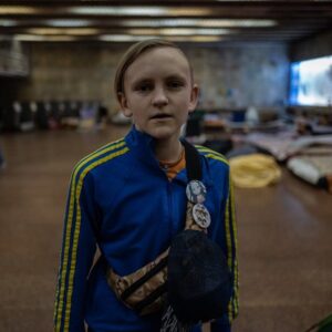 Cary Joji Fukunaga Instagram - Hundreds of people still live in the Heroes of Dnipro metro station in the Obolon district of Kyiv, many of them children. Despite Russia’s retreat, most fear Russian reprisal attacks, and air raid sirens still sound throughout the night. Galyna runs this station. She hasn't been home since the war began as there is still too much to do. The first days saw up to 2800 people crowding into the cold-war era shelter, replete with an underground cafe and pharmacy, and in case of a nuclear attack, 40cm thick iron blast doors that still shut at curfew. Volunteers from @wckitchen deliver meals and fresh fruit daily, where we met Dima who shared with us his dream of leading a boy-band (note @btsbighitofficial pin) one day. Also pictured are local volunteers entertaining the children and handing out toys. One side of the station had set up a cinema for the kids, and on our last visit I was surprised to see the movie of the night was… #notimetodie :)
