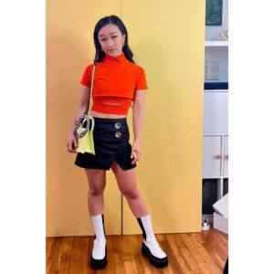 Cathy Ang Instagram - Last weekend with my boo and #netaporter for #nyfw 😘 Photo by @zevst , then some bonus shenanigans… 
.
Styled by @meg_galvin 
💄: @ayatariqmua
💇🏻‍♀️: @japanese_michael 
Top & skirt by #meryllrogge 
Boots by #charleskeithofficial 
Purse by #massimoboninishowroom 
Earrings by #lelesadoughi 
Inspired by #scoobydoo 🐶 
#velma #daphne