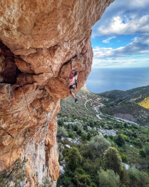 Cedar Wright Instagram - One of the beauties of the @thenorthface athlete summits is that they bring together passionate athletes from disparate sports.  Climbers, Skiers and Ultra-Runners! Years ago at a TNF event in Yosemite I found myself at the base of manure pile buttress w a bunch of runners and skiers.  I asked “who wants to climb to the top of this thing?” At first it was silent and then a long  haired hippy looking kid named @nickmcnutt raised his hand. “I’ll go I guess,” he said. I sized him up… he looked capable enough.  I would later find out that he was one of the best free skiers in North America… something of a phenom! “Have you ever climbed before?” I asked him. “Once in a climbing gym for a birthday party,” he replied.  I was in a particularly cavalier stage in my life and so I figured what could go wrong? I quickly taught him a figure 8, and how to belay and then we launched up The Nutcracker… stout 5.8… a formidable first outdoor rock climb.  I told him that eventually the rope would go tight and then he could start climbing.  Nick’s first rock climb was a simul-climb of nutcracker!  Nick miraculously sent and survived… and was STOKED!!! He asked me all kinds of questions on the descent and a couple weeks later he had his own chalk-bag, harness, and shoes. The rest is history.  He began what will surely be a life-long obsession with climbing and most impressively became a prolific first ascentionist in squamish where he moved to be closer to climbing.  Now when he isn’t busting ski acrobatics off of gnarly mountain spines in Alaska he is obsessively crushing granite FAs!  Nick developed an entire new crag for which he won a trophy!  I’m so Proud! It was awesome to reconnect and climb with Nick at the Athlete summit in Sardinia this year and I can report that he is a full on legit real rock climber now!  Nick continues to excel at skiing and has credited climbing with making him more resilient and athletic on the slopes!  Nick snapped this photo of me… proving I too still climb😜. After hanging tough I realised Nick is an excellent partner.  Now things are coming full circle.  Nick and I are planning a big remote first ascent expedition for this summer!