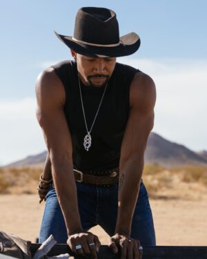 Charles Michael Davis Instagram - “A man who becomes conscious of the responsibility he bears toward a human being who affectionately waits for him, or to an unfinished work, will never be able to throw away his life. He knows the "why" for his existence, and will be able to bear almost any "how".”

—Victor Frankl, Man's Search for Meaning

📸 @bettinabogar 
👖 @estella.png 
💄 @chousner

Necklace is a custom design by @joeavianne and @aviannejewelers