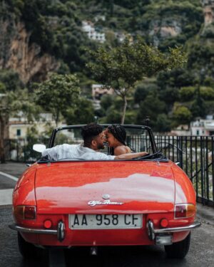 Cheryl Des Vignes Instagram - Saying some player shit to a girl I always wanted 🏁

Two weeks in Italy at the beginning of May also marks 1 year of our engagement. Decided we couldn’t go to a place as beautiful as the Amalfi Coast and not celebrate by finally taking engagement photos. Somehow we got down to these 10, but we’ve been staring at all 90 since we got them back lol. Maybe we’ll go through them all on YouTube 🤔

📸: @amalfitana_photographer 
🏎️: @spiderlifestyle
