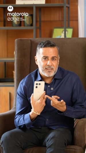 Chetan Bhagat Instagram - I truly believe that productivity is being able to do things you were never able to do before. Every author, including me, faces writer’s block, but finally I’ve found my perfect productivity partner. Launching the new #MotorolaEdge50Ultra! From clicking Insta-ready shots with AI Photo Enhancement to unleashing my imagination with the AI Magic Canvas, this phone keeps my creative juices going.
When it’s time to get productive, the 3D Curved Display with a 144Hz refresh rate makes writing smooth and enjoyable. And thanks to Smart Connect, I effortlessly switch between devices, keeping my productivity at its peak.
And did I mention the world’s 1st FSC Certified Real Wood Finish? It feels so great in my hand! If you’re looking for a phone that’s #EffortlesslyIntelligent in both work and play, check out the Motorola Edge50 Ultra today itself!

This World’s 1st Wooden Finish Phone Launched in 12 512GB @ Rs 49,999* and will be available on Flipkart, motorola.in and leading retail stores starting 24th Jun with limited period special offers.

#EffortlesslyIntelligent #MotoAI #LetsSmartConnectWithMoto  #Collab @motorolain