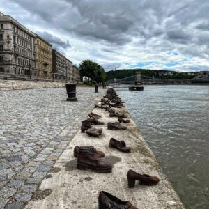 Cheyenne Jackson Instagram - @curtisleejamie took me to this yesterday and I’m still thinking about it.  Installed along the bank of the Danube River in Budapest, conceived by Can Togay with sculptor Gyula Pauer, the monument consists of 60 pairs of 1940s-style shoes, true to life in size and detail, sculpted out of iron.  It depicts the shoes left behind by the thousands of Jews who were murdered by the Arrow Cross.  Forced to take off their shoes, shot, and then thrown into the river.