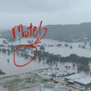 Chris Bath Instagram - John & Annabelle bought the Lakeside Lodge Motel @lakeside_lodge_lismore (“that never floods”) in Nov 2020 & moved north to Lismore from Torquay. They persevered through the tourism shock of bushfires & a pandemic that was never part of their business plan, then found themselves trapped on the motel’s rooftop with 24 of their guests, as floodwaters rose around them #swipeleft See #linkinbio They spent a terrifying six hours with a birdseye view of the rising water, until strangers in tinnies arrived & rescued all of their guests. They were the last ones off the roof (thanks to a dude they only know as “Dylan from Lennox Head”) I met them last Thursday when they arrived back in clothes that someone gave them at the pub when they turned up soaking wet once Dylan dropped them to safety (Annabelle reckons it’s the only chance she’ll ever have to rock a PhoKing t-shirt). Alone, they started the long clean up. Mud everywhere, they dragged sodden carpet, mattresses, TV’s & fridges from rooms, somehow with a warm, dry sense of humour, resigned to what they needed to do to get their business up & running asap because “Lismore’s gonna need accomodation & we need to get some money through the door.” While we were there filming for @theprojecttv John got a call from @bookingcom hassling for their booking fees.  John told them “mate we’ve just been smashed by a flood, I don’t think that’s appropriate right now”. I spoke to John yesterday.  They’ve called three times since.  Seriously @bookingcom it’s time for a multinational like you to do your bit & waive booking fees for tourism operators like John & Annabelle.  They don’t want charity, but they could do with a break.  They’ve slaved for a week to clean out their motel, knowing that whoever helps repair their region will need somewhere to stay.  And to give you an idea of the some of challenges they face, no matter how hard they work, it’ll be weeks before they can get electricity in their rooms (every power point has to be checked by Council), the rubbish they’ve dragged out remains dishearteningly on their doorstep because there’s simply so much of it to remove in Lismore.  So hey @bookingcom why not throw them a bone?