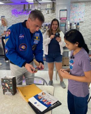 Chris Cassidy Instagram - Today I met an amazing 12 year old entrepreneur, Olivia Huynh, the owner of @therocketbelly rocketbelly in Arlington, TX.  With her passion for stars and planets, she and her family opened a space-themed cafe featuring a menu of self-serve bubble teas, out-of-this-world chicken, and homemade baked goods. This talented, bright, insightful, and fearless young lady inspires all who meet her.  Great job, Olivia!