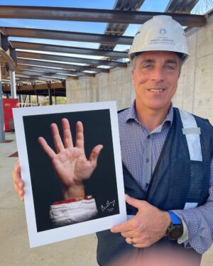 Chris Cassidy Instagram - Standing in the future “Mission Control Center” of the @mohmuseum holding an image of one of the hands contributing to building this museum and leadership institute.  #medalofhonormuseumfoundation will receive the net proceeds from every sale of these high quality, life-sized, signed photos.  MyHandMyCause.com for more details and to place an order!  #myhandmycause #medalofhonor #military #medalofhonormuseum #medalofhonorinstitute