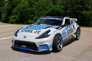 Chris Forsberg Instagram - Not only is Atlanta one of my favorite tracks to drive, but I love this round because the team over at @nismopartsusa @nissanusa are able to make it out to the track to show their support, and they always bring a Z! It’s incredible to see what this team has become, look at this line up! #nissan #nismo #z