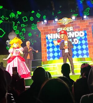 Chris Hardwick Instagram - It’s-a-us! Thank you @nintendoamerica & @unistudios!!! Going to the opening of #SuperNintendoWorld #AtUniversal last week was a lifelong gaming dream come true. It’s fully immersive and really does feel like you’re in a Mario game. There is a great AR Mario Kart ride, a bunch of mini games that interact with your power up band, and a themed restaurant with yummy food. @lydiahearst & I had the bestest bestest time!