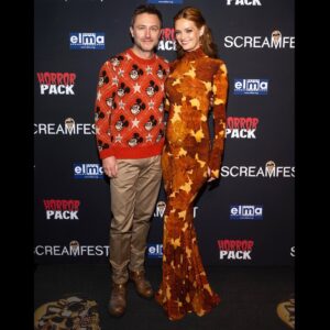 Chris Hardwick Instagram - @lydiahearst & I went to @screamfestla last night to watch the premiere of her movie American Boogeywoman (streaming everywhere now!) which was the first time we’ve been to a movie theater in like 2 years! I was afraid to give a big toothy smile because we had been shooting pics in the theater right before this where we were shoveling handfuls of popcorn into our mouths and I had what can only be described as a holiday tree’s worth of popcorn string in my teeth. Had I opened my mouth, you’d have seen CHUNKS of popped corn that were wedged between my gums to the extent that it would have looked like I was doing a bit. (Note: my dad always carried toothpicks with him and now I finally get it.)

We had such a blast, Lydia looked amazing and was FANTASTIC in the movie. Also, I’m digging the threads! We were AUTUMNAL AF. Excited to be out with my amazing pregnant wife during our favorite time of year! 🎃

📸: @acefotopro for @gettyimages