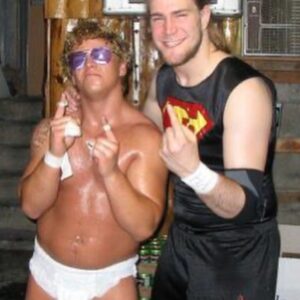 Chris Spradlin Instagram - Some pictures from a long time ago in a galaxy far, far away…

1- February 2000, Hannover, Germany. My first trip outside the US. 

2- May 2005. In the basement of Emmaus Fire Co. # 1. Sweet & Sour International had lost a Diaper Match. 

3- Totally Tool Wrestling in August 2004. Wearing the “Twinkie the Kid” outfit alongside esteemed official Bud Remsburg. 

4- IWC in December 2002. Under the enchantment of Shirley Doe.