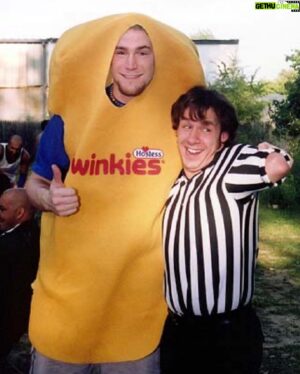 Chris Spradlin Instagram - Some pictures from a long time ago in a galaxy far, far away…

1- February 2000, Hannover, Germany. My first trip outside the US. 

2- May 2005. In the basement of Emmaus Fire Co. # 1. Sweet & Sour International had lost a Diaper Match. 

3- Totally Tool Wrestling in August 2004. Wearing the “Twinkie the Kid” outfit alongside esteemed official Bud Remsburg. 

4- IWC in December 2002. Under the enchantment of Shirley Doe.