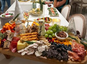 Christi Paul Instagram - Never underestimate the power of female friends. 🙏🏻❤️
Swipe to see the hostess @lauracasotv with THE mostest & a glorious #Charcuterie board she put together! 
Late with the pictures but still glowing from the holiday gals get-together a couple weeks ago. 🎄
OK ONE boy was allowed but he was little & such a charmer! How could he not be there?! 
#MerryChristmas #HappyHanukkah #HappyEverything #Friends #Celebrate #Grateful #FeelingTheBlessings