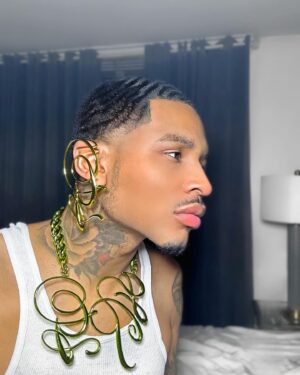 Christian Banks Instagram - High Driven Jean Paul Gaultier Wear 🦎 

YEA