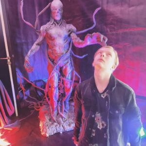 Christian Ganiere Instagram - Thought it would be fun to reconnect with my old buddy #Vecna at @proudnerdconventions #welcometostarcourtcinema Today in Koln... Apparently I was wrong. Guy still doesn't like me. Even after all this time...
.
.
#ChristianGaniere #IamNumber010 #NumberTen #Number010 #IamNumberTen #Strangerthings #Strangerthings4 #strangerthingsedit #strangerthingscast #Strangerthings4life #strangerthingstv #Rainbowroom #strangerthings #Hawkinslab #strangerthingsedit 
#netflix #netflixseries #hawkinsnationallab #rainbowroom #upsidedown #elevenstrangerthings #dufferbrothers #strangerthingsfan #theupsidedown #hawkinsnationallaboratory #strangernumbers #hnl