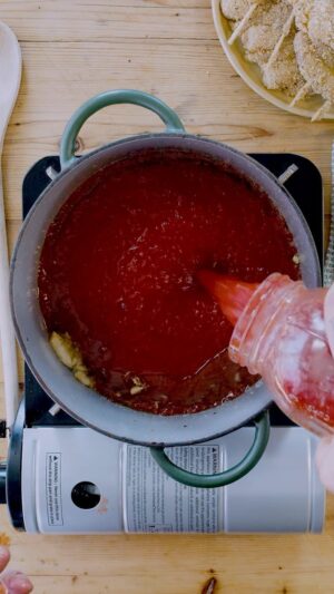 Christian Petroni Instagram - I had lots of first gen friends & family that converted their driveways into jarred sauce factories at the end of summer when tomatoes are at the sweetest. Stocking their pantries and using it throughout the year.

*shoutout to @lesleyporcelli for sharing a few jars of her families hard work with me 🍅❤️