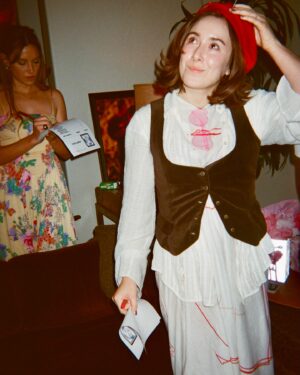 Christina Scherer Instagram - @hannahgmarks is a disposable camera addict. And now there is proof I actually wear cute outfits out…or that I even leave the house to go out…sometimes. Rarely. Let’s be honest, I read over 70 books these last few months. I am more honestly in the blue robe (slide 5) goblining around the house. Reading fantasy novels and eating cherries 😇