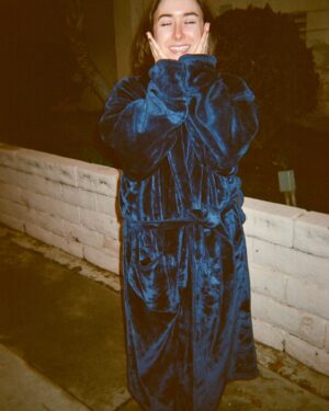 Christina Scherer Instagram - @hannahgmarks is a disposable camera addict. And now there is proof I actually wear cute outfits out…or that I even leave the house to go out…sometimes. Rarely. Let’s be honest, I read over 70 books these last few months. I am more honestly in the blue robe (slide 5) goblining around the house. Reading fantasy novels and eating cherries 😇
