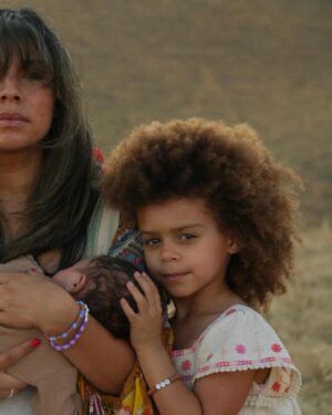 Christina Vidal Instagram - A Mother’s Love
You have a strong commitment
A Mother makes comfort 
Her arms and embrace.
An open heart
That her heritage may enter,
The love that keeps faith.
She will keep in perfect sacrifice 
That which calls her name,
Because they trust in her.
Her wisdom, a guiding light,
Her patience, as boundless as the skies,
Her words, the threads that peaceful dreams claim.
Like a tree planted by streams of water,
Yielding fruit in its season,
Her leaves, untouched by the scorch of disaster,
In her, the root of love finds reason.
Her laughter scatters the shadows,
Her courage, the fortress for their fears.
Through the trials and the meadows,
Her constancy, a lighthouse through the tears.
Blessed is the fruit of her hands,
And let her works bring forth praise at the city gates.
For a Mother’s love, stronger than time’s sands,
Endures, a legacy that never abates.