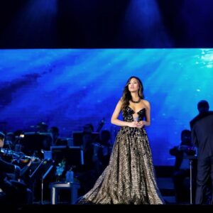 Christine Allado Instagram - Opened the show with this @cherryveric beauty 😍 sensual, elegant yet modern and so much fun to wear on stage, thank you @cherryveric for letting me sing in your beautiful dresses again ❤️🎶 and thank you #intermittentfasting for getting me to fit into these teensy ass dresses! 
Directed by @archangel_frank 💖
Styling by @geanthony 👗💅💍