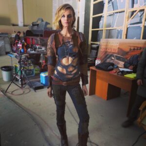 Christine Marzano Instagram - Kickin ass and takin names!  In a holey shirt (as everyone seems to do in dystopian future scenarios) #deathrace #femalelead #actionmovie