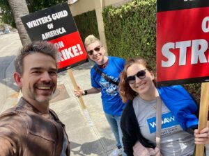 Christopher Gorham Instagram - 100 days. The AMPTP has kept the @wgawest on strike for 100 days with no end in sight, refusing to negotiate in good faith. These are pics from day 1. The writers kindly offered me a WGA shirt to put on over mine after the first lap. We’ve been standing with our brothers and sisters from the beginning and we’ll be there until the end. Join us out at Warner Bros today!  #sagaftrastrong #wgastrong #1u
