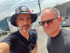 Christopher Gorham Instagram - One of these handsome rogues has multiple Emmy awards. The other one has a hat with multiple buttons. Both of them are on strike and standing strong with @sagaftra and @wgawest until we get a fair deal. 💪🏼💪🏼 Love ya, @okbjgm !