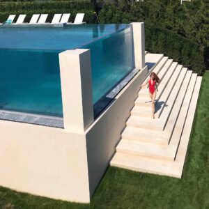 Claire Friesen Instagram - backyard infinity pool and spf 110 😆