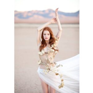 Claire Friesen Instagram - Another favorite from our shoot!
#repost @stacychilders 
#houseofstylesd 
Photographer & Stylist - @stacychilders 
Corset by @fioricouture 
Model : @claire_friesen 
#fashion #desertshoot #editorial #crowns #corsets #couture #wmagmodelsearch #weloveyourgenes #wlyg