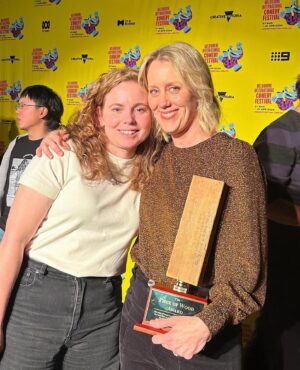 Claire Hooper Instagram - I’m floored to receive the Piece of Wood Award today. 
It was a complete blindside and I didn’t have the presence of mind at the podium to say thank you, let alone mention my long suffering husband and good friend, Wade Duffin, and the fact that it’s our 16 year wedding anniversary today. And I didn’t mention the beautiful mate who’s the only reason I’ve been able to keep doing this job and who I miss so much. 
Thank you to her, and to my husband, and to the Wood folks for letting me in their weird club, to my loves at Token, and the Festival, and to all the incredible comedians and producers who inspire me and support me and make me proud to be part of this community. (Especially @nic_minstergram, @livelaughlauren__, @teen_zhangst, @bronlewiscomedy and the Newcomer Nominated @lozdriz who were such a joy to work with this Festival). 
I’m confused now because I thought my show title was sarcastic but I’m feeling some absolutely revolting earnest pride now, what has this done to me?
