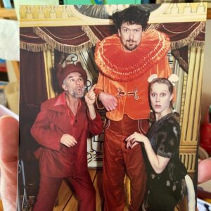 Claire Hooper Instagram - I’ve chucked another bonus ep of my podcast up! Recorded with this gentleman and in this car. Sam Longley, comedian, improviser, stage and screen actor, and very tall man. Heads up, his story is groooooosssss. I loved it.
(Third photo: from Barking Gecko’s Aesop and his Fables. From over 20 years ago. With Tilly Ozdelay. Sam is the biggest one and I am the smallest one ❤️)