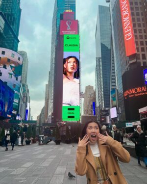Claudia Tan Instagram - She’s upgraded to a ✨Times Square billboard✨ now 

I took this photo of me in 2022 in front of the exact same billboard while I was in NY for Wattcon so that I can manifest this exact day where my face would be on it (& photoshop the actual banner over it). Needless to say, it actually happened & I’m still shook about it! 😍

Huge thanks to @onerpmpac & @theisaacmiranda for making this happen ❤️ I’m so proud to be your @spotify & @spotifyasia EQUAL ambassador for July. Tune into next Friday for my next single!