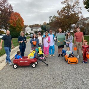 Collette Wolfe Instagram - A grumpy Superman and his parents #halloween2022