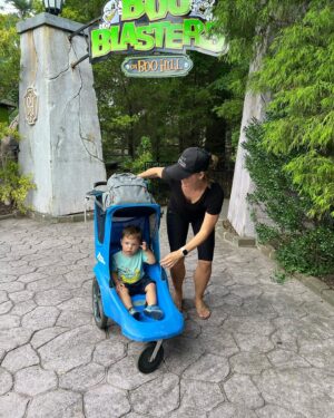 Collette Wolfe Instagram - He didn’t cry on any of the rides but he also didn’t love it. His favorite thing was eating goldfish and running away from me every time I let him out of the stroller😅🤣🐥 #kingsdominion #toddler #snoopy