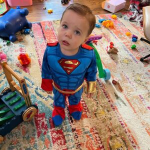 Collette Wolfe Instagram - A grumpy Superman and his parents #halloween2022