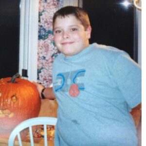 Corey Cott Instagram - Almost my favorite time of year again. Pumpkins and basketball. What better way to commemorate the return of fall but with this photographic masterpiece. What a photo. What a time. What a shirt. Bedsides the clipart thrift-store vision of a what a basketball court looks like, my favorite detail has gotta be the stain just north of the belly button. What exactly is that stain? Poptart filling? Brisk Iced Tea? Bagel Bite sauce? We’ll never know. But I‘ll tell you what - this kid doesn’t care. Light as a feather, this king. Yes chef. He’s floatin’ some closed-mouth-smile cockiness because he just absolutely decimated the eyes out of a pumpkin with a $2 pick, and nothing is stopping him now, or ever.
