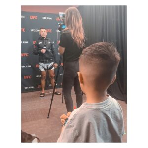 Cortney Casey Instagram - What a week we had. Although it wasnt Kings first fight week it was definitely the first one he can remember. We had a fun road trip to Vegas with our favorite road dawg @bulldawg155, Helped dad cut weight and got to watch dad fight live and put on amazing performance. King meet @meganolivi and although he was shy he did say she was pretty. Of course we celebrated dads win with sugar. #AZ #KingKlose #Vegas #UFC #DadsMini #MyLoveBug #YellowCrayon #POTN #OurLittleFamily #MakingMemories