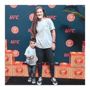 Cortney Casey Instagram - What a week we had. Although it wasnt Kings first fight week it was definitely the first one he can remember. We had a fun road trip to Vegas with our favorite road dawg @bulldawg155, Helped dad cut weight and got to watch dad fight live and put on amazing performance. King meet @meganolivi and although he was shy he did say she was pretty. Of course we celebrated dads win with sugar. #AZ #KingKlose #Vegas #UFC #DadsMini #MyLoveBug #YellowCrayon #POTN #OurLittleFamily #MakingMemories