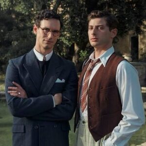 Cory Michael Smith Instagram - A First Look at #TRANSATLANTIC, launching on @Netflix on April 7th.

Series created by Anna Winger (@wingerworldwide) and Daniel Hendler (@dannyboy7886).

Produced by Anna Winger and Camille McCurry (@camillemccurry).

Directed by Stéphanie Chuat (@chuatstephanie), #VéroniqueReymond, and Mia Meyer (@miamaariel).

With an international acting company that includes #GillianJacobs, @lucasenglander, #CoreyStoll, @ralph.amoussou, @deleila_piasko, @amitrahav, @gregory_montel, @raffnic, @birane_ba_cf, @lolitachammah, #LukeThompson, @hannokoffler, @henrietteconfurius, @nadivmolcho, @yolifuller, @moritzbleibtreu, @louisdodelencquesaing, @alexakarolinski, @handekodja, @alexanderfehling, #JodhiMay, @morgane.ferru, @jakobdiehlofficial, #BogdanZamfir, @gerasandler, @ronitasherisandler, @mila_rigaudon, and MORE!

Our international crew was top notch, with some special love going out to our costume designer @justineseymourcostumedesign, our head of makeup @chapellevalerie, and head of hair #MorganeSalou.

Photo credit: @anikamolnarphoto 🫶🏻